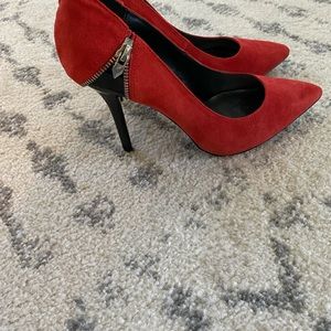 Red suede pump by Fergie. Never worn size 9